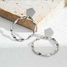Fashion metal simple cool wind twisted hoop earrings TrendyRush